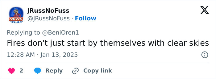 Tweet suggesting conspiracy theories about La Palisades fire with a comment on clear skies.