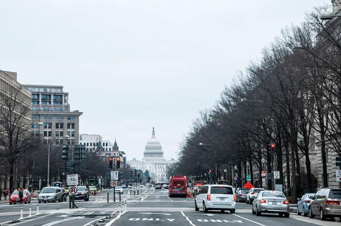 Street view of Washington DC with the Capitol building, related to Black Hawk conspiracy and secret drill discussion.