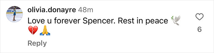 Heartfelt message grieving Spencer, with emojis of a broken heart, praying hands, and dove.