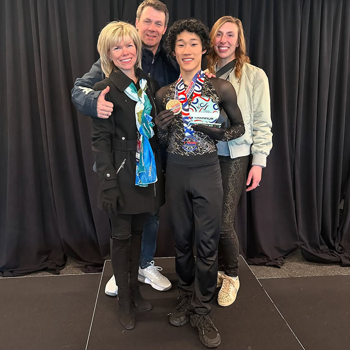 Teen skaters posing with medals sharing proud moments before plane tragedy.