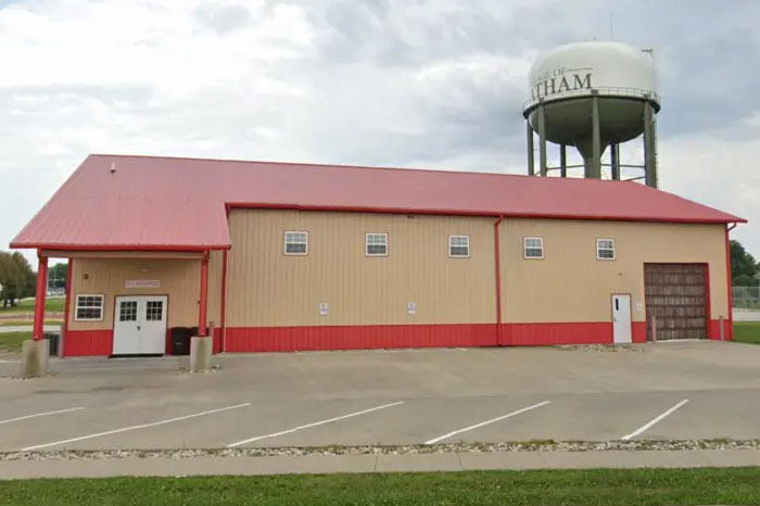 After-school camp building in Illinois near water tower, related to four young victims killed in vehicle crash incident.
