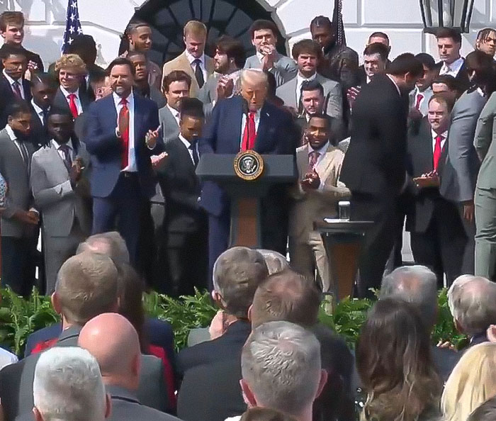 &ldquo;Keep Them Down&rdquo;: Trump Pulls Absurd Stunt To Look Taller Than Towering Ohio State Football Team