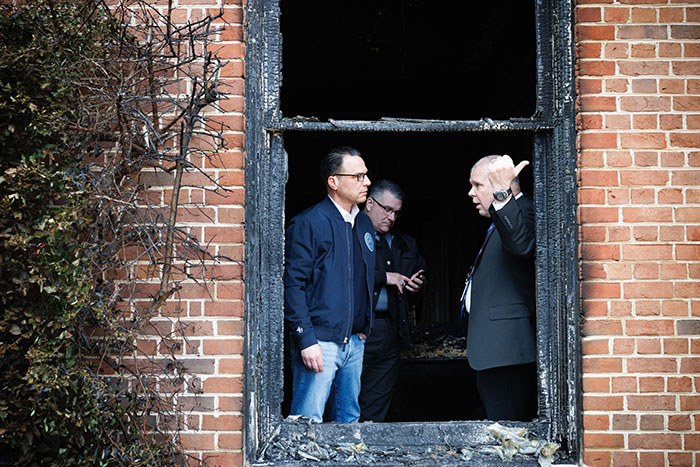 Investigators examine damage at PA Governor's home after being allegedly torched by Cody Balmer.