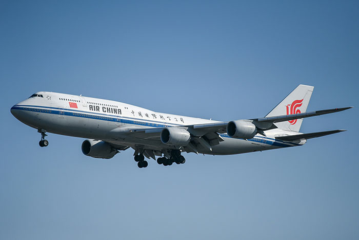 Air China Boeing 747 mid-flight, highlighting Russia's Boeing sanctions loophole strategy.