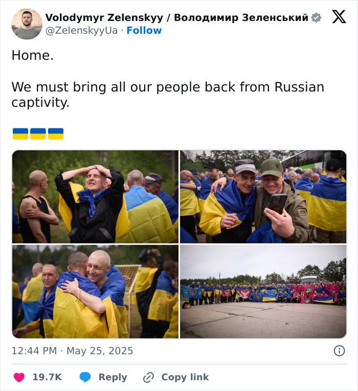 Former Ukrainian captives wrapped in flags reunited with loved ones during largest Russian attack on Ukraine release event.