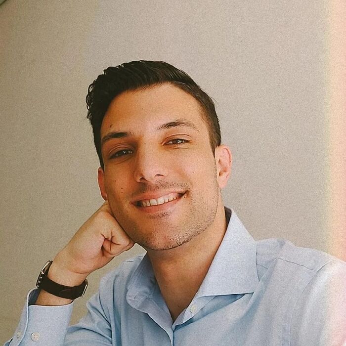 Young man smiling in a light blue shirt, representing the Israeli embassy couple fatally shot at the capital Jewish museum.