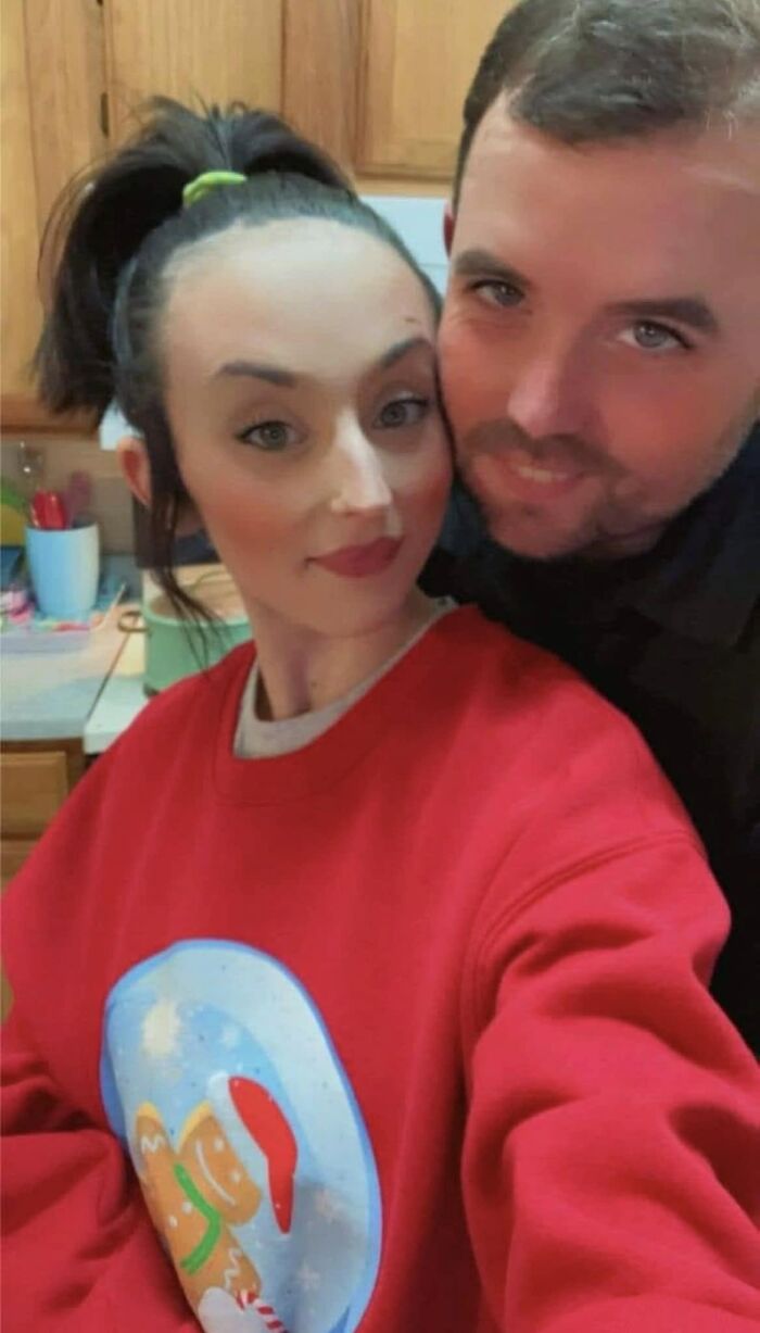 Couple posing closely in a kitchen setting, linked to allegations of forcing a girl to survive on one Pop-Tart a week.