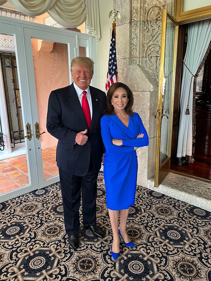 Donald Trump and Fox News host standing indoors by a flag, highlighting Trump picks Fox News host for D.C. post.