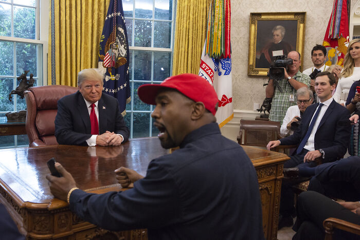 Donald Trump meets with Kanye West and others in the Oval Office amid discussions on Larry Hoover sentence commutation.