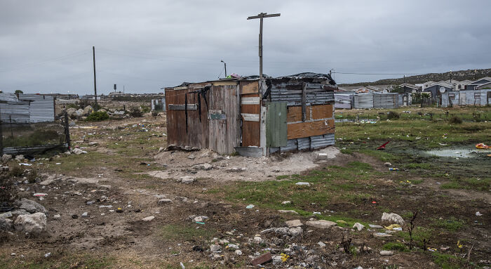 Dilapidated shack in a rural area symbolizing poverty linked to mother jailed for life after selling daughter to healer.