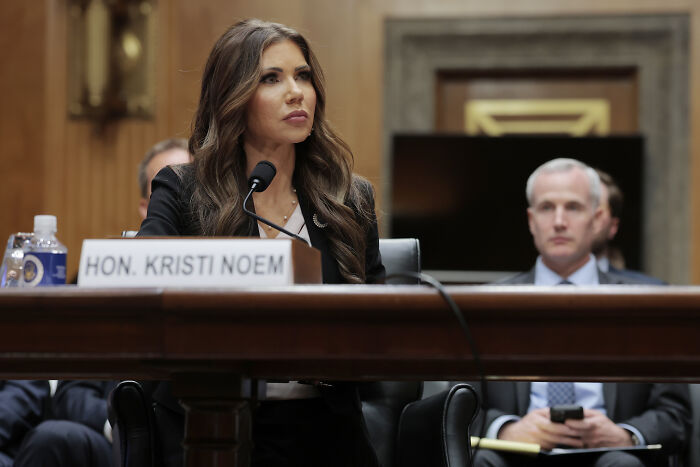 Hon. Kristi Noem speaking at a formal hearing focused on issues affecting international students at Harvard.