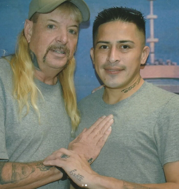 Joe Exotic and his husband posing together after their prison wedding before deportation news involving Trump.