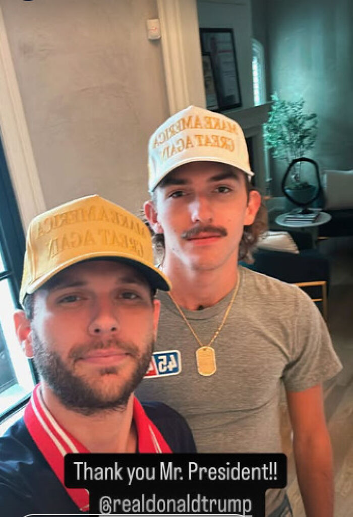 Two men wearing Make America Great Again hats inside a home referencing Trump pardon amid bank fraud news.