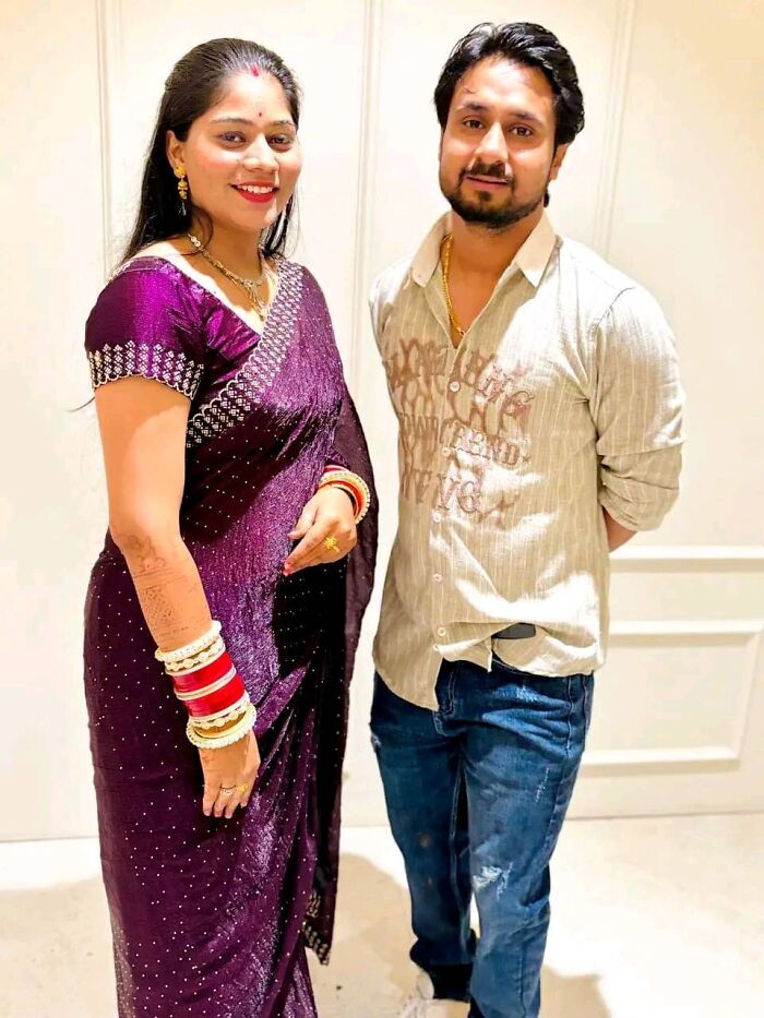 Bride and groom posing together indoors, related to missing bride surrender and alleged husband murder case on honeymoon.