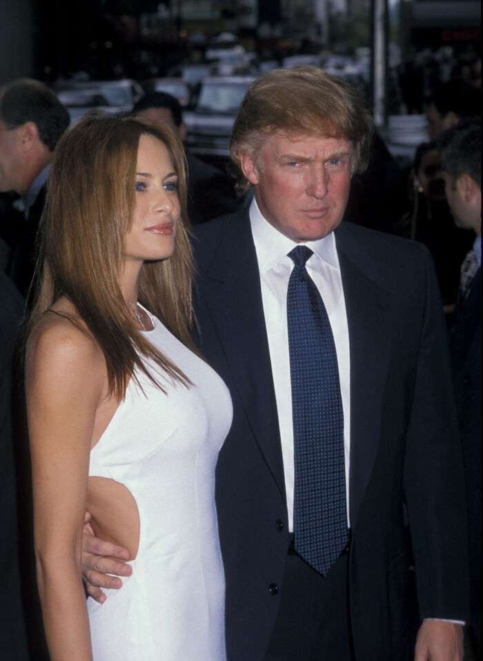Donald Trump and Melania posing together at a formal event, related to audio on Epstein Lolita Express.