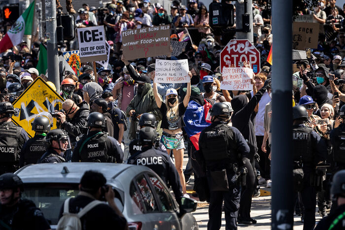 Protesters face heavy police presence during military crackdown in Los Angeles amid Newsom criticism of Trump.
