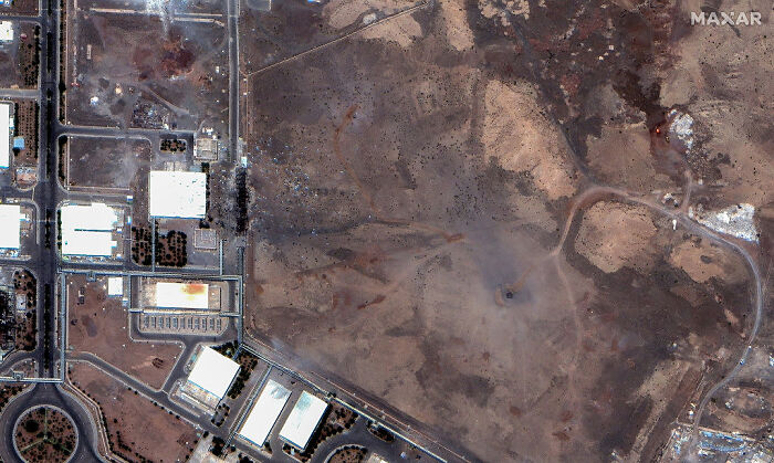 Satellite image showing a barren site in Iran amid early reports raising doubts on success of U.S. Iran strikes.