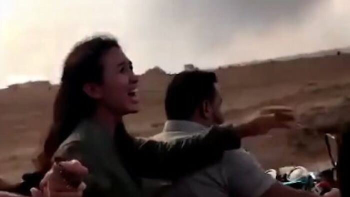 October 7 hostage in a confrontation outdoors, visibly upset while addressing terror sympathizers shouting Hamas is coming.