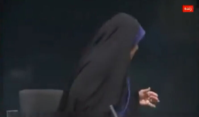 Female anchor in hijab running for life after Israeli missile hits Iran state TV during live broadcast.