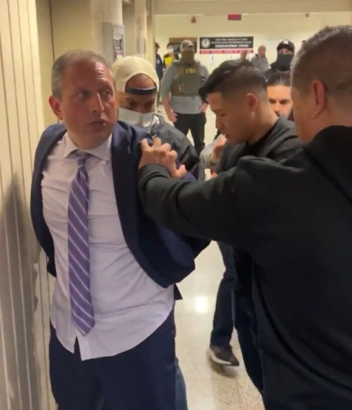Brad Lander, New York mayor candidate, being detained by ICE agents after intervening to help an immigrant.