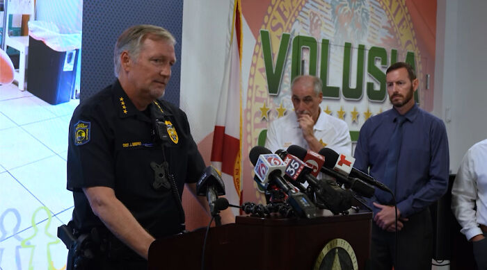 Police officer giving a press conference about baby boy dies after father leaves him in boiling car in Florida incident.