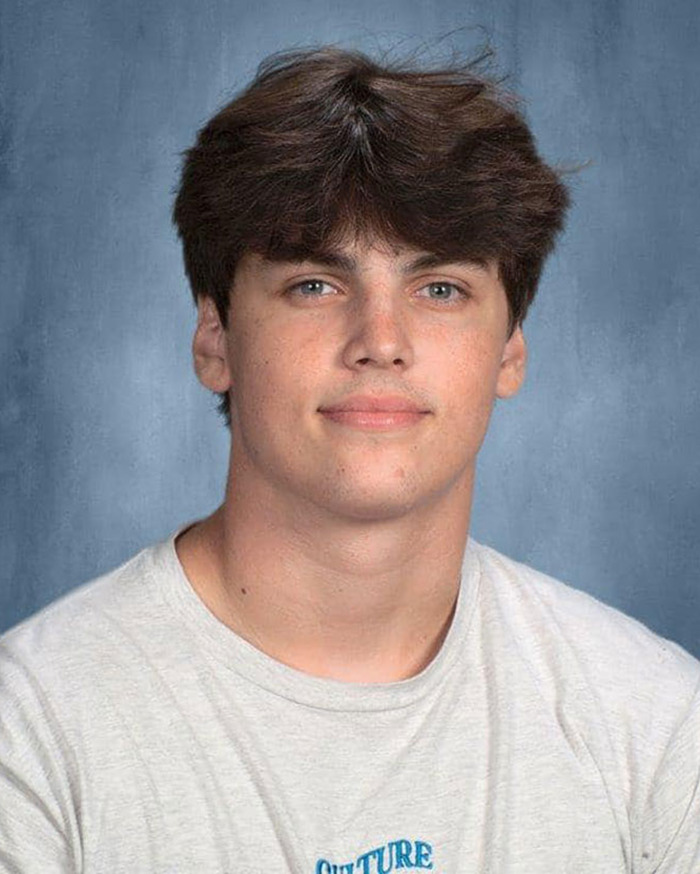 Karmelo Anthony, 17, young male with brown hair and light shirt, related to track meet stabbing news story.