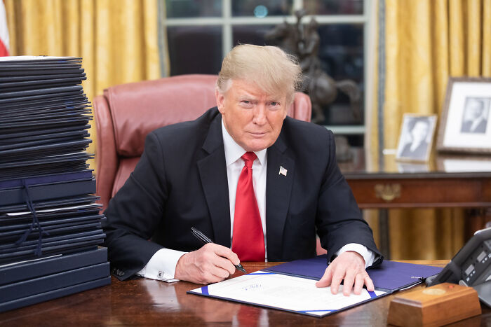 Donald Trump in the Oval Office signing the big, beautiful bill after Congress greenlights it following House showdown.