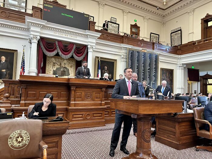 Republican politician speaking at statehouse podium during legislative session amid abortion controversy allegations.