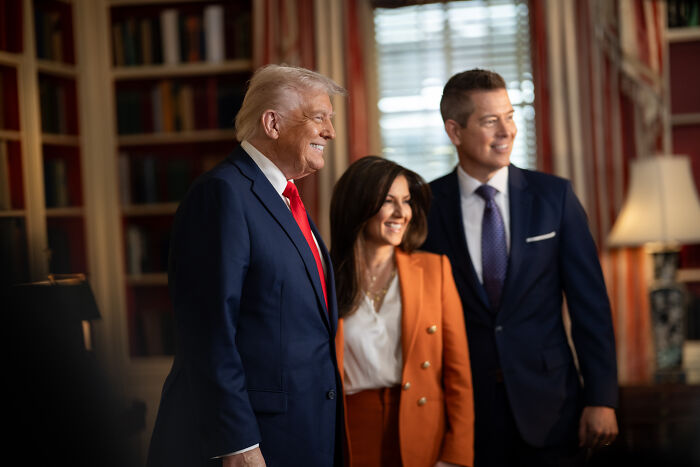 Donald Trump with two people in a formal room, focusing on MTV reality star and new NASA boss announcement.