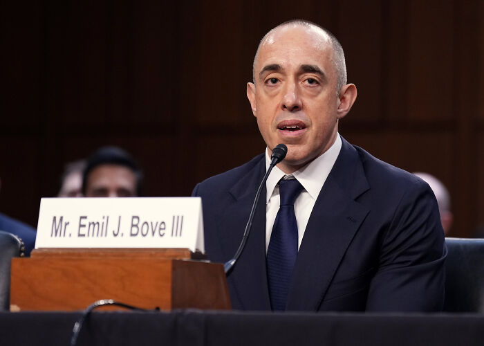 Emil Bove speaking at a Senate hearing, confirmed for lifetime judge role despite whistleblower claims.