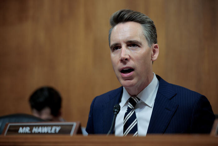 Senator Josh Hawley speaking at a congressional hearing, addressing issues related to the stock trading ban.
