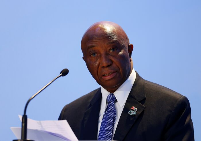 Liberian president speaking at a podium, dressed in suit and tie, amid Trump&rsquo;s comment backlash on English skills across Africa.