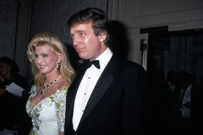 Donald Trump in a tuxedo with a woman in a white dress, highlighting old Trump accusations in the Epstein context.