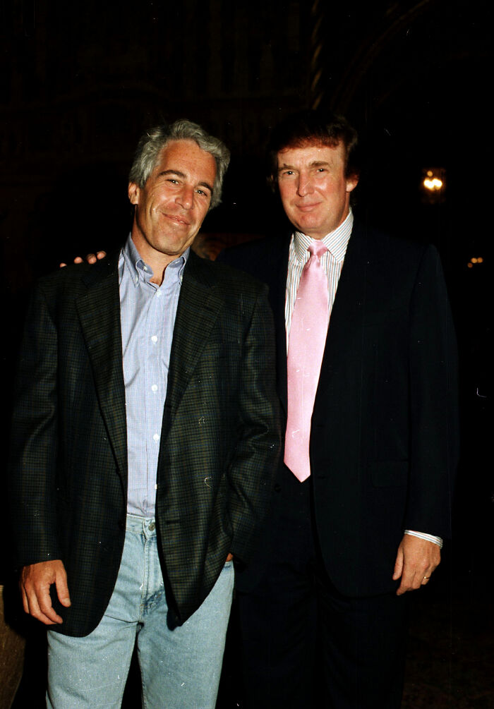 Jeffrey Epstein and Donald Trump posing together at an event, relevant to Epstein files mentioning Trump.