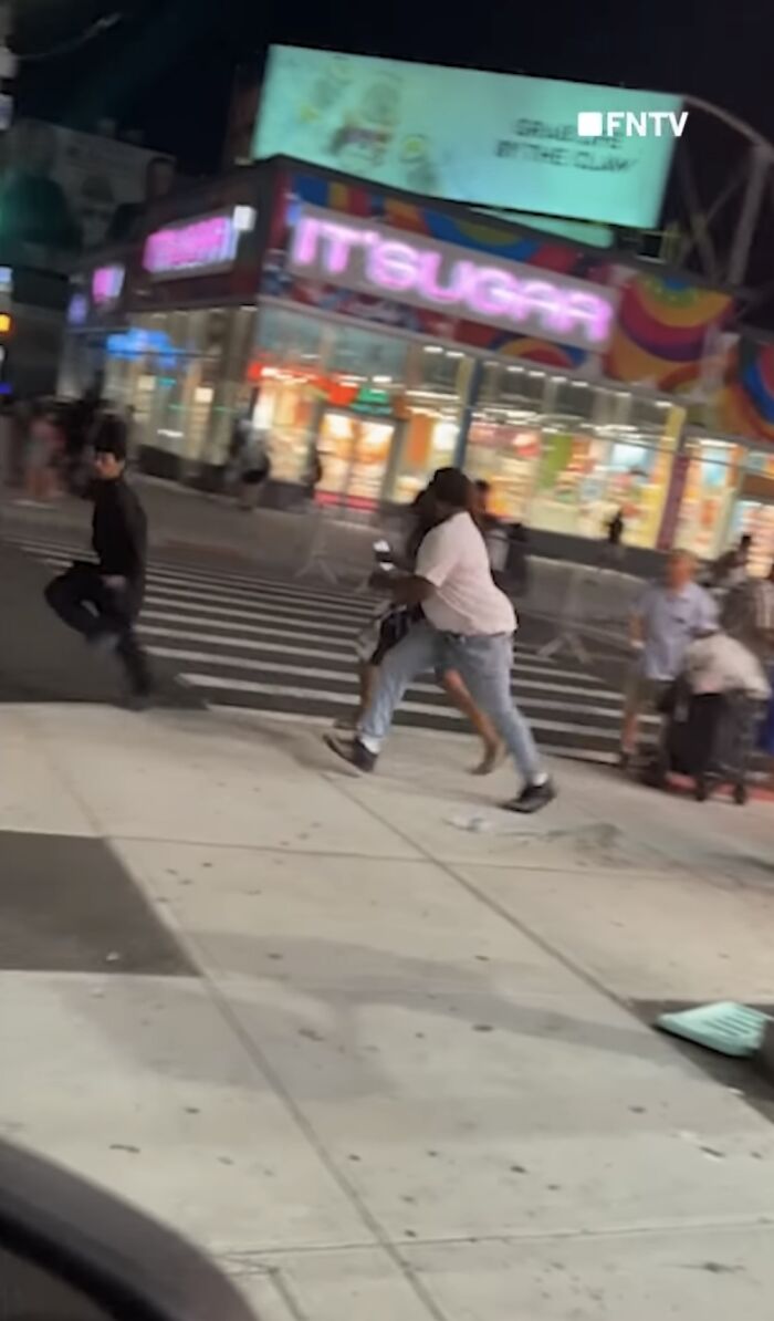 Man running on busy Coney Island street in viral video showing brazen kidnapper lifting boy as parents give wild chase