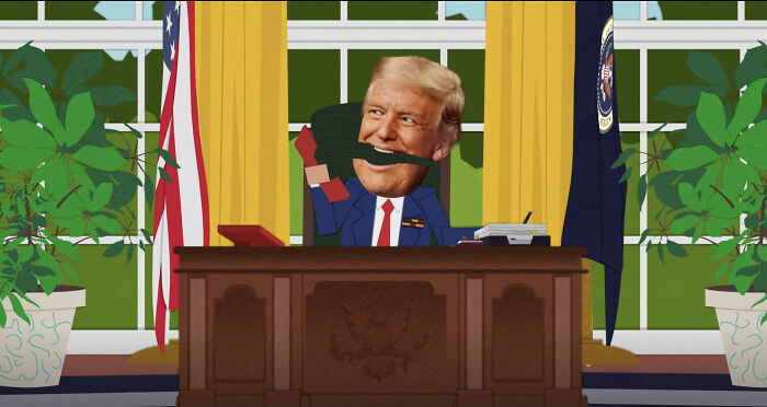 South Park animated scene mocking Trump sitting at the Oval Office desk with an exaggerated expression.