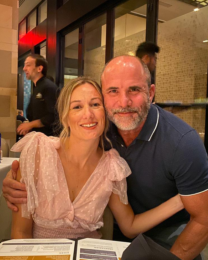 Couple dining together at a restaurant, highlighting a dad's soul-crushing voicemails before Texas floods swept him away.