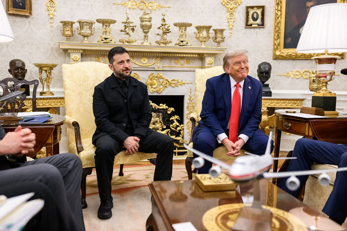 Ukrainian president and Donald Trump seated in the Oval Office during a formal meeting at the White House.