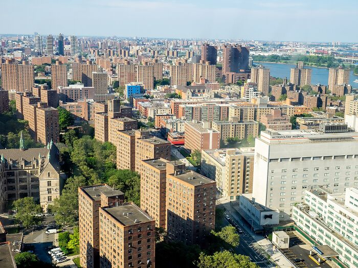 Aerial view of New York City buildings and Metropolitan Hospital amid Legionnaires&rsquo; disease outbreak affecting residents.