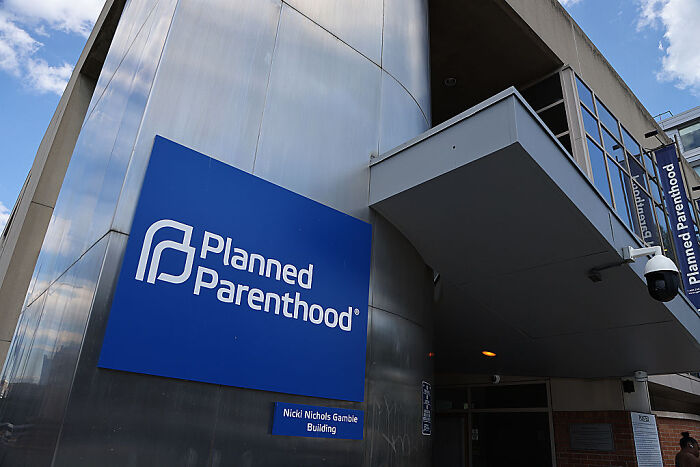 Planned Parenthood building exterior representing changes in women&rsquo;s reproductive rights and health cuts in the U.S. and abroad.