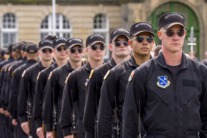 U.S. Air Force honor guard members standing in formation, representing service members affected by retirement pay block.