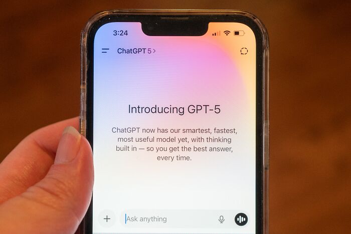 Smartphone screen showing ChatGPT 5 introduction, highlighting dangers of relying on AI therapists for teen mental health.
