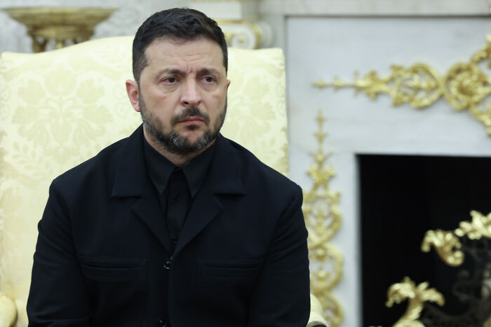 Ukrainian leader seated in formal setting, symbolizing the fury ignited by Woody Allen&rsquo;s Moscow film week appearance.