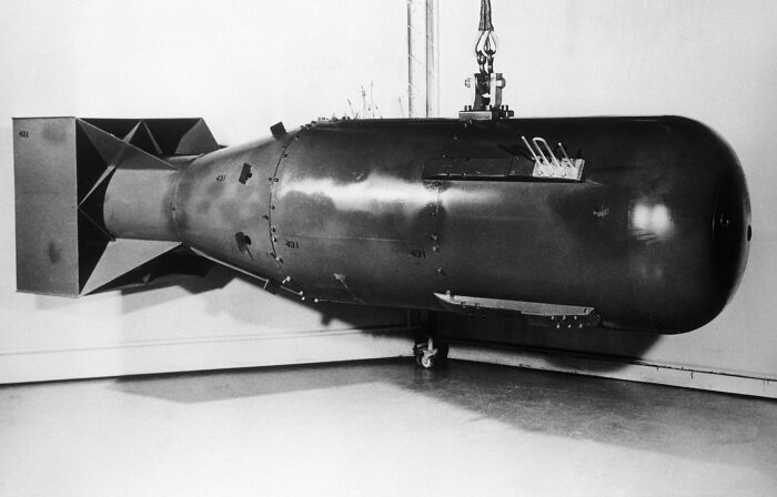 Historic atomic bomb displayed in a museum, representing the impact of Hiroshima and Nagasaki in avoiding World War III.