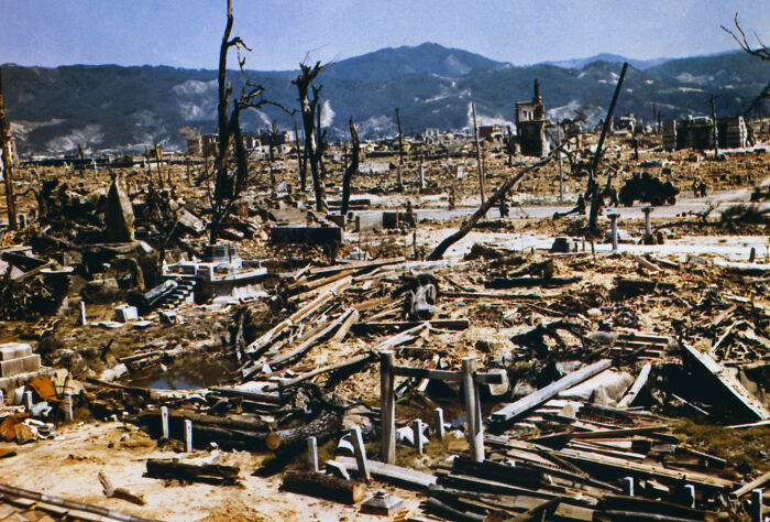 Destruction in Hiroshima after the atomic bombing, highlighting the aftermath and lessons to avoid World War III.