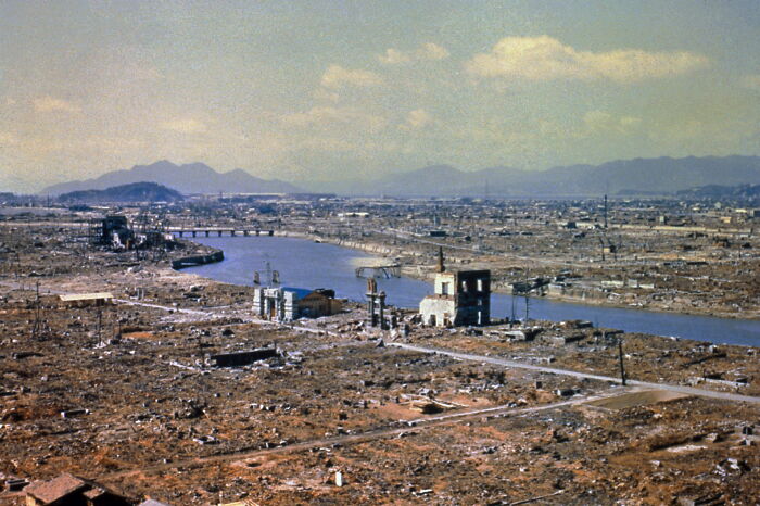 Aerial view of Hiroshima's devastation after the atomic bombing, highlighting lessons to avoid World War III.