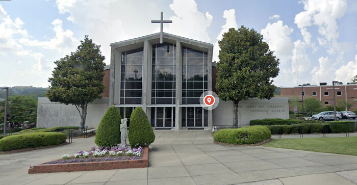 Front view of Alabama church building with cross, related to Alabama priest accused of secret romance with teen dancer.