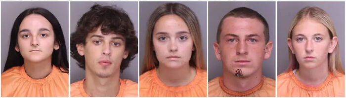 Mugshots of the teen and cheerleader girlfriend accused of planning his fatal fate, wearing orange jail uniforms.