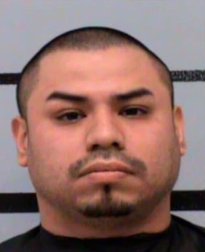 Mugshot of a man accused of manslaughter after giving a baby girl Benadryl to spend time with his wife.