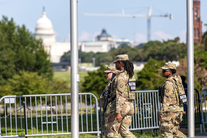 National Guard troops patrolling near the Capitol amid rising tensions over domestic violence remarks backlash.